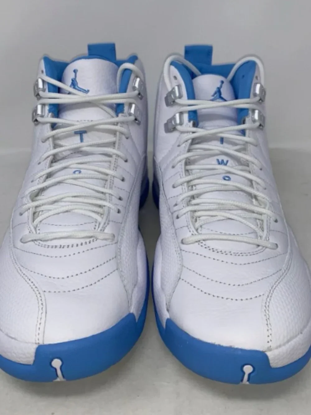 Air Jordan 12 'Melo UNC University Blue' White Sneakers